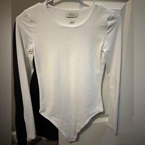Aritzia white long sleeve bodysuit. NEW!